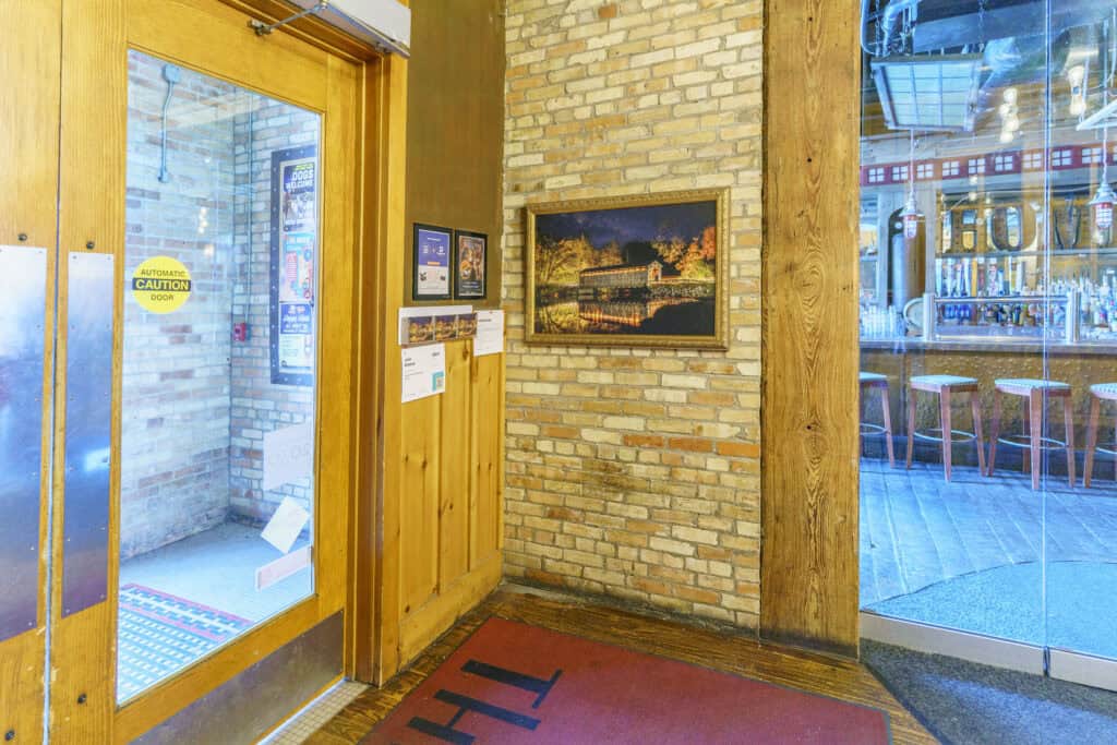 Interior view of the B.O.B. in Grand Rapids MI during ArtPrize with John Dimond's entry on the wall just inside the door.